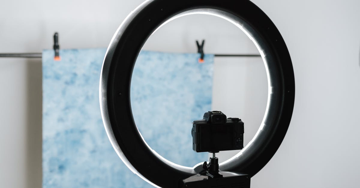 On-site photography workshop in Nepal or India - Contemporary photo camera and studio lamp prepared for photo session in professional studio On-site photography workshop in Nepal or India - Contemporary photo camera and studio lamp prepared for photo session in professional studio