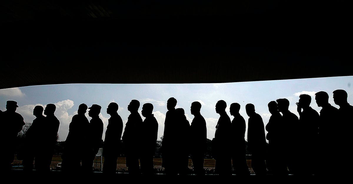 Other passports queue arriving in UK? - Group of Men Forming a Libe Other passports queue arriving in UK? - Group of Men Forming a Libe