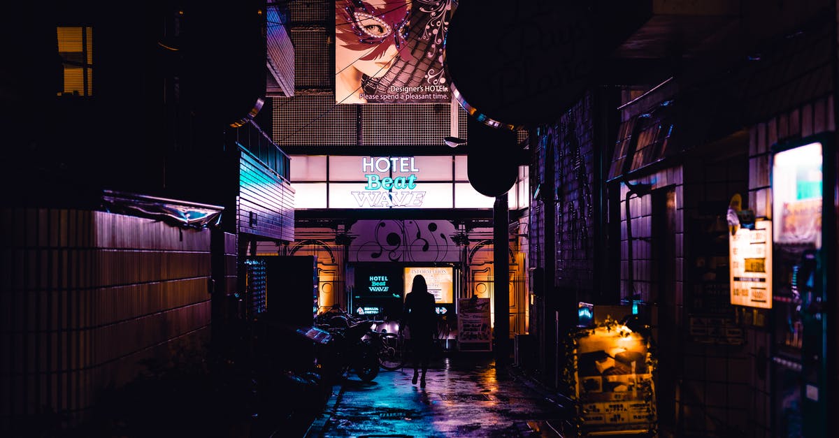 Overbooking: compensation for a lost hotel night? - Person Standing Near Hotel Door Overbooking: compensation for a lost hotel night? - Person Standing Near Hotel Door