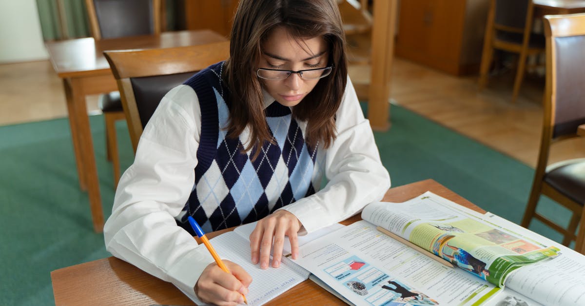 Overstayed Student Visa for 2 years in Canada, almost 8years ago [closed] - Close-Up Shot of a Girl Studying in the Library