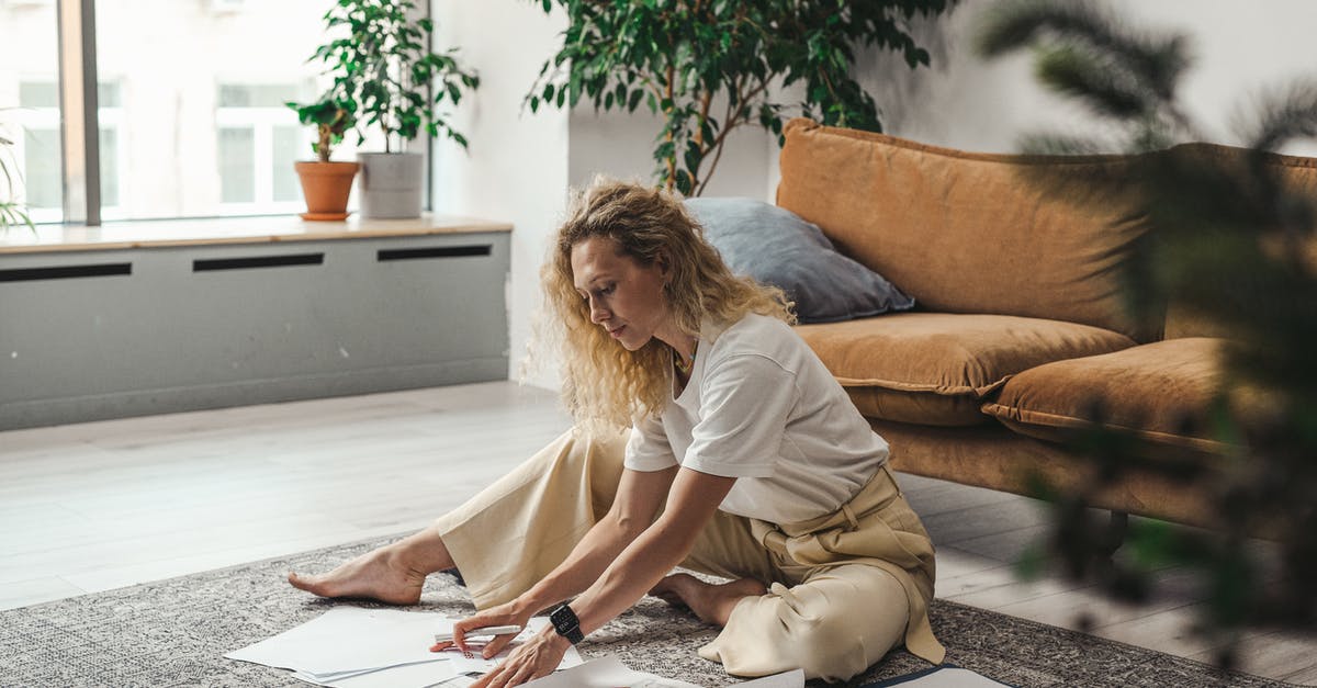 Overstaying and documents - Woman in White Shirt Sitting on Brown Couch Overstaying and documents - Woman in White Shirt Sitting on Brown Couch