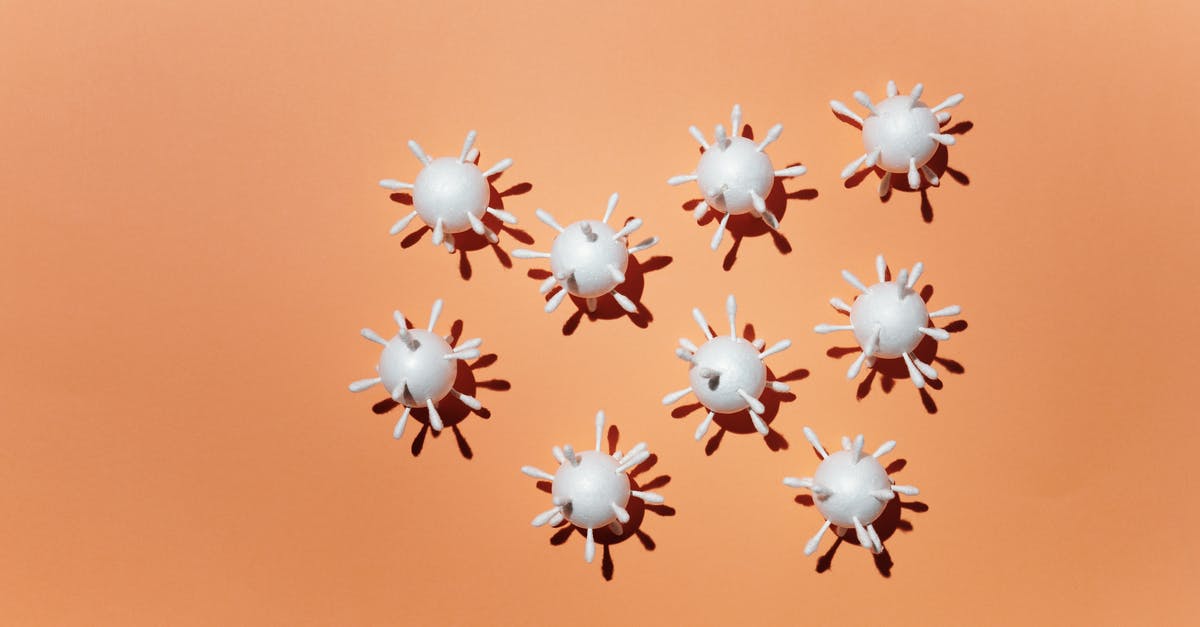 Overstaying Schengen visa due to Covid-19 infection: What are the consequences? - Coronavirus Scale Model on Peach Background Overstaying Schengen visa due to Covid-19 infection: What are the consequences? - Coronavirus Scale Model on Peach Background