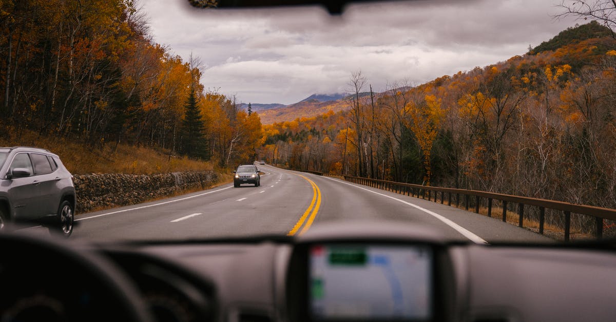 Oyster - buying travelcard after journey on same day - Car riding on highway through autumn forest Oyster - buying travelcard after journey on same day - Car riding on highway through autumn forest