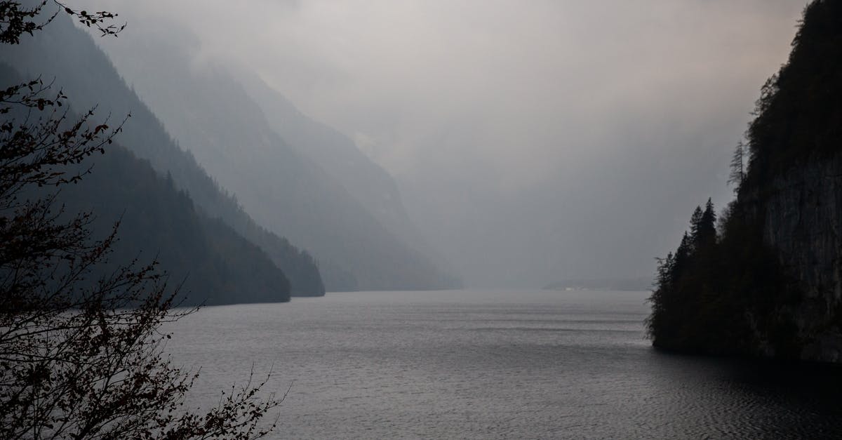 Oyster - buying travelcard after journey on same day - Breathtaking view of mountainous terrain with lake in cloudy day Oyster - buying travelcard after journey on same day - Breathtaking view of mountainous terrain with lake in cloudy day