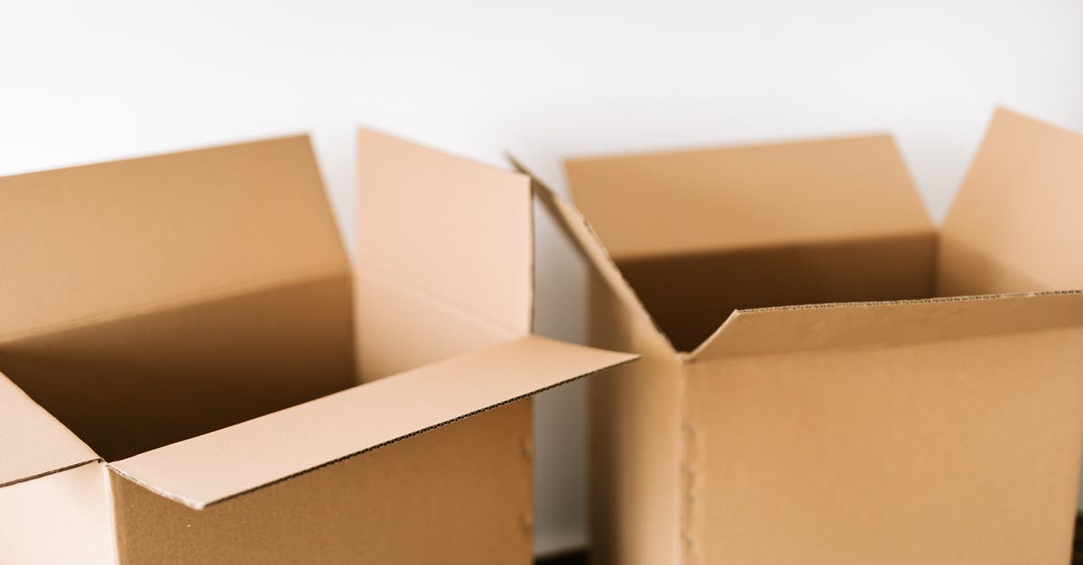 Package storage / pickup location near LAX? - Opened carton boxes placed on dark surface against white plain wall in daylight before moving out Package storage / pickup location near LAX? - Opened carton boxes placed on dark surface against white plain wall in daylight before moving out