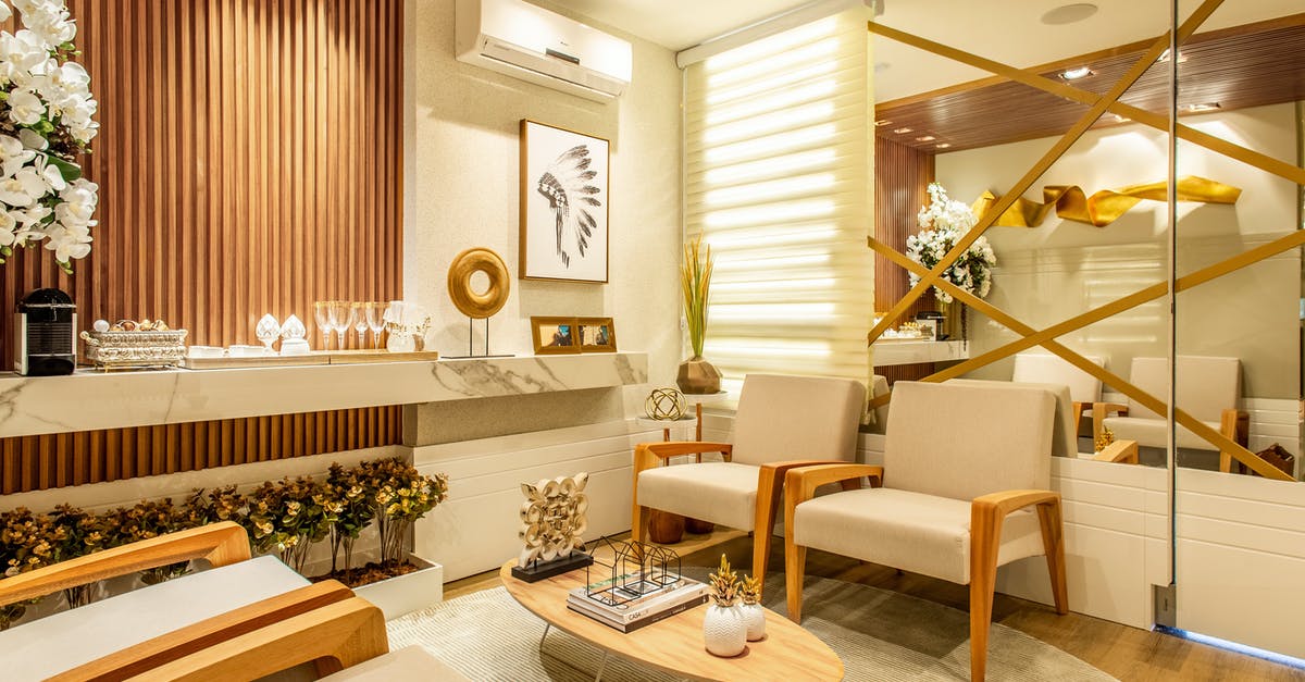 Paid hotel as condition for getting visa? - Two Gray Padded Beige Wooden Chairs Paid hotel as condition for getting visa? - Two Gray Padded Beige Wooden Chairs