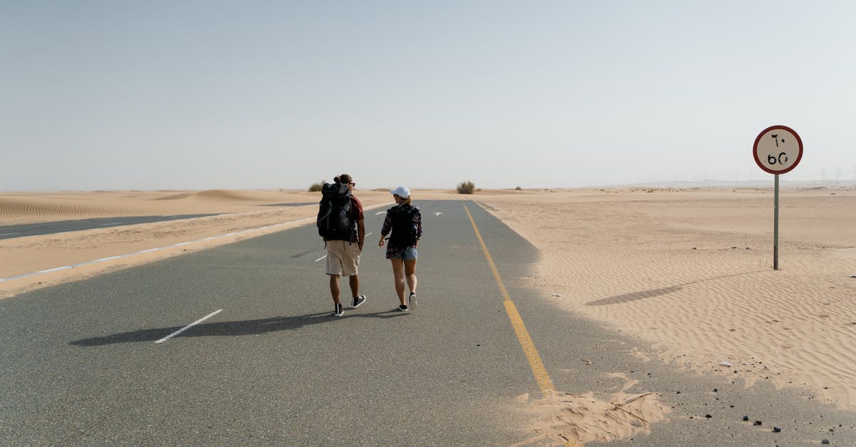 Pakistani passport validity for traveling from UAE to Pakistan and back - Two People Walking on the Road Pakistani passport validity for traveling from UAE to Pakistan and back - Two People Walking on the Road