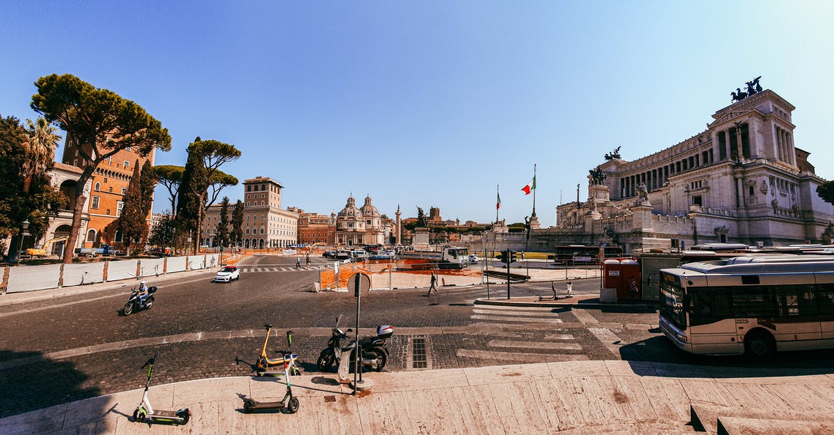 Parking rules for motorbikes in Rome, Italy - Transport on road of old historical district Parking rules for motorbikes in Rome, Italy - Transport on road of old historical district