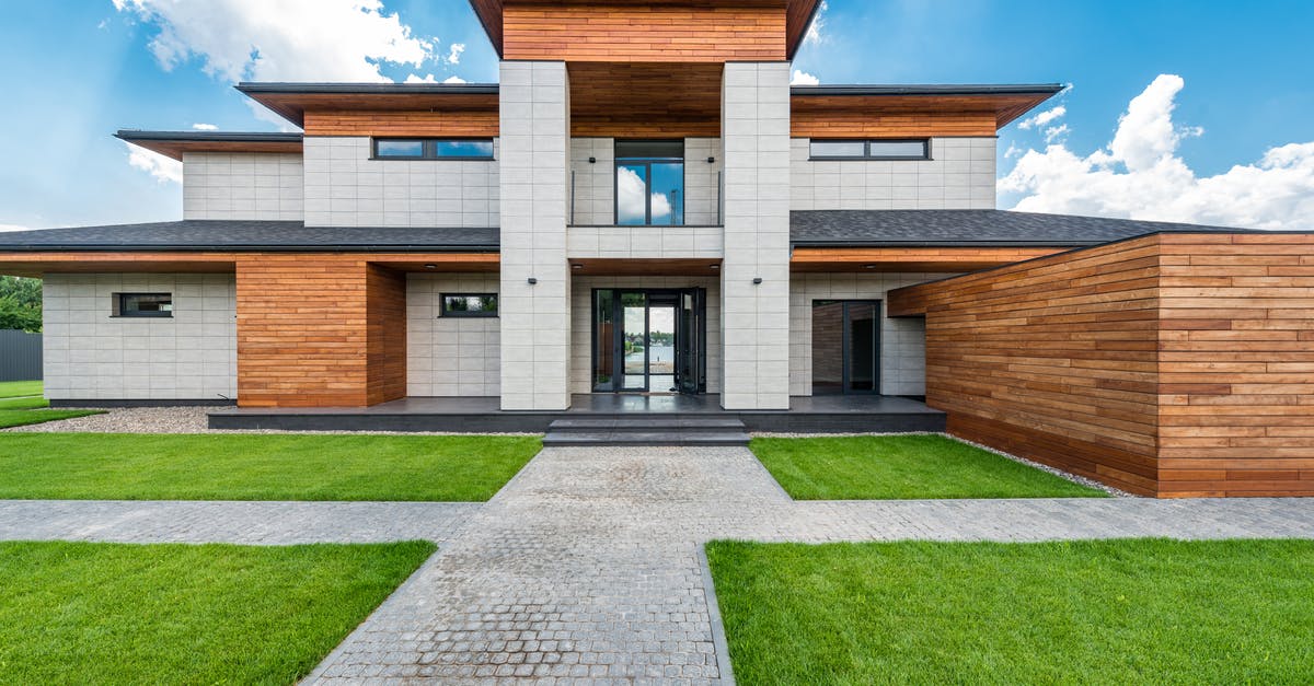 Partial accommodation evidence for UK standard visitor visa - Contemporary villa against cloudy blue sky Partial accommodation evidence for UK standard visitor visa - Contemporary villa against cloudy blue sky
