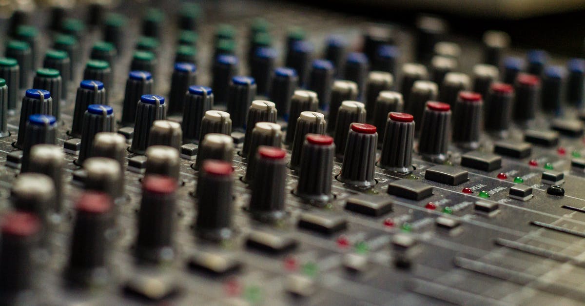 Passport control in different airports (Entry and Exit) [closed] - Sound mixer with rows of knobs in recording studio