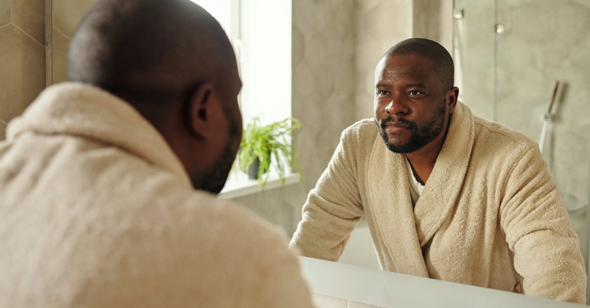 Passport validity inside Schengen Area for African person - Man Wearing Bathrobe Looking at the Mirror Passport validity inside Schengen Area for African person - Man Wearing Bathrobe Looking at the Mirror
