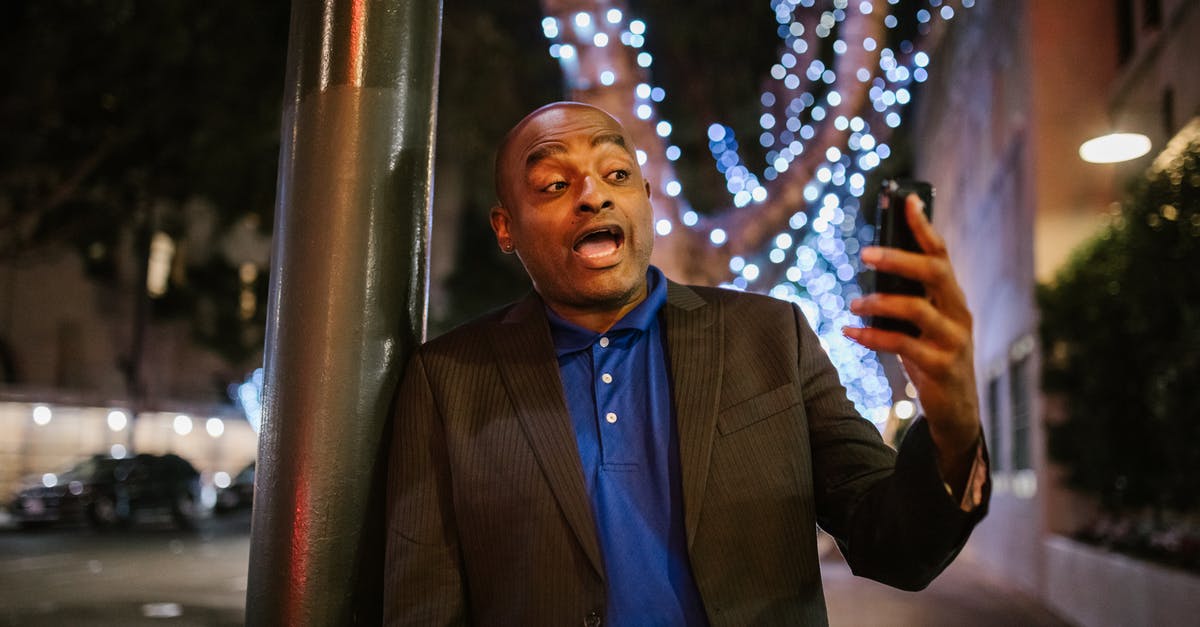 PDF tickets on phone on Deutsche Bahn - Free stock photo of african american man, bald, businessman PDF tickets on phone on Deutsche Bahn - Free stock photo of african american man, bald, businessman