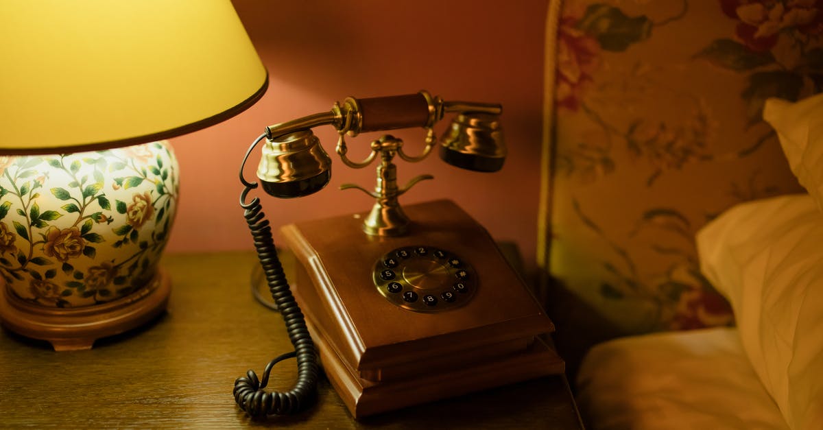 Phone service crossing borders, Vietnam>Thailand>Laos>Cambodia - Vintage Telephone Beside the Bed Phone service crossing borders, Vietnam>Thailand>Laos>Cambodia - Vintage Telephone Beside the Bed