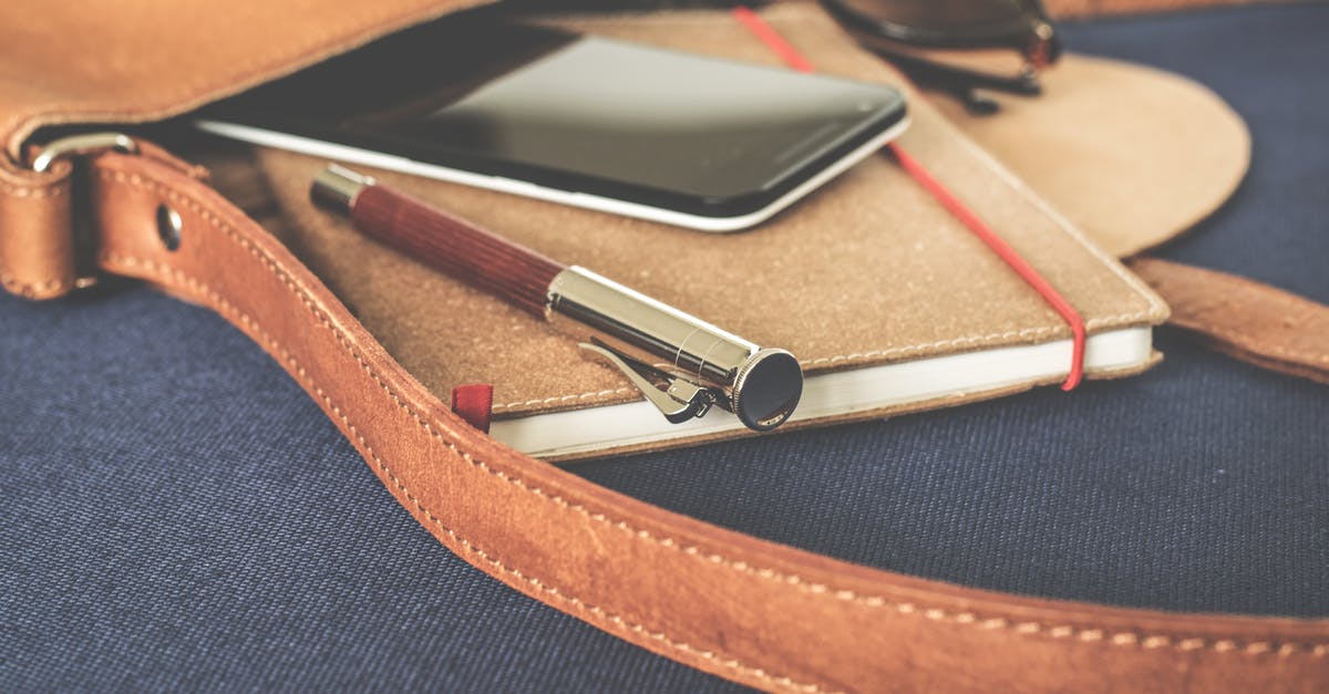 Phone SIM Card for multiple countries - Smartphone Displaying Black Screen on Notebook Beside Pen and Sunglasses Phone SIM Card for multiple countries - Smartphone Displaying Black Screen on Notebook Beside Pen and Sunglasses
