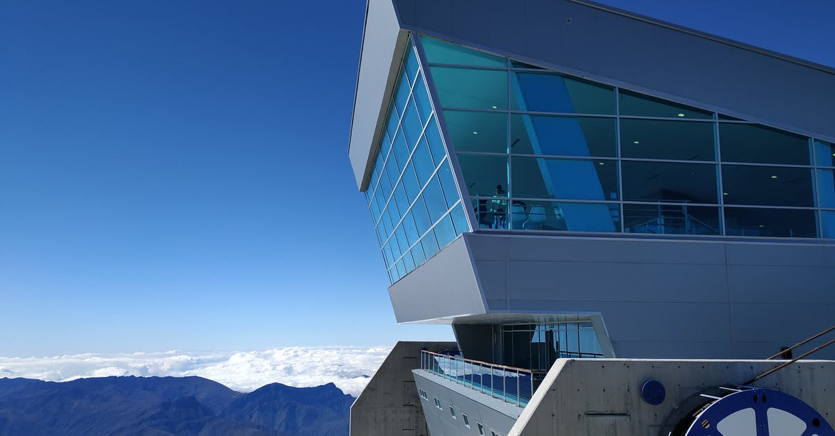 Pico de Aneto ascent - White and Blue Glass Building Pico de Aneto ascent - White and Blue Glass Building