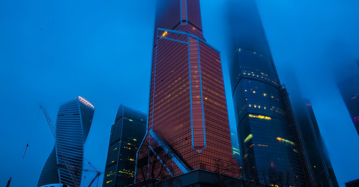 Place to leave my luggage in Barcelona for one night and get it back early in the morning - Low Angle Photography of High Rise Buildings Covered With Fogs Place to leave my luggage in Barcelona for one night and get it back early in the morning - Low Angle Photography of High Rise Buildings Covered With Fogs