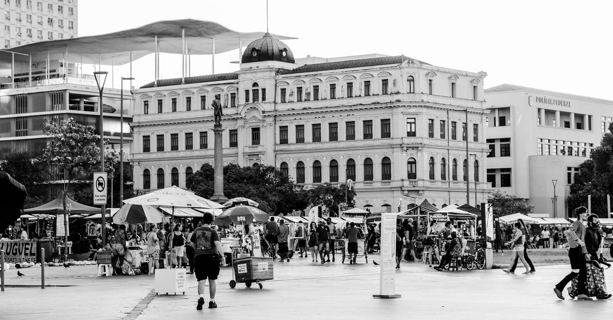 Place to store a few items in Ayia Napa on day trip from Nicosia (Cyprus) - Square in centre of big city with big buildings and open market stalls and full of people in sunny summer day Place to store a few items in Ayia Napa on day trip from Nicosia (Cyprus) - Square in centre of big city with big buildings and open market stalls and full of people in sunny summer day