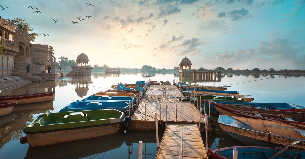 Places in India where no vehicles are allowed - Colorful Boats On Wooden Dock Places in India where no vehicles are allowed - Colorful Boats On Wooden Dock