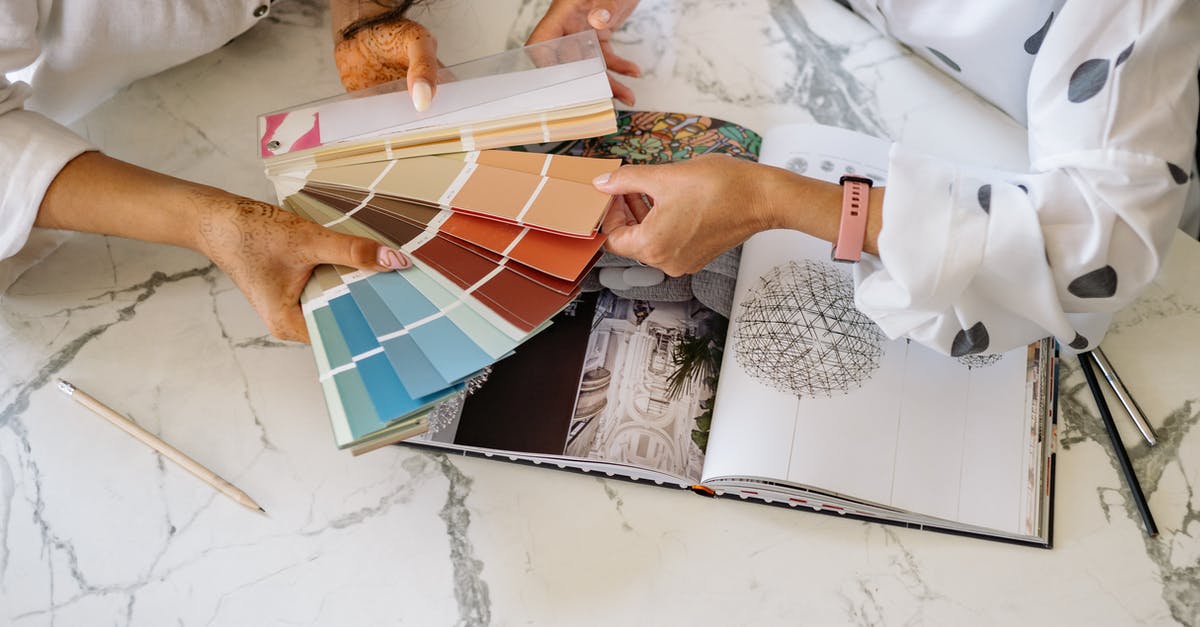 Planning to ask a long-term visa after tourism visa: which documents to pass the border? [closed] - Women Holding a Sample Color Chart