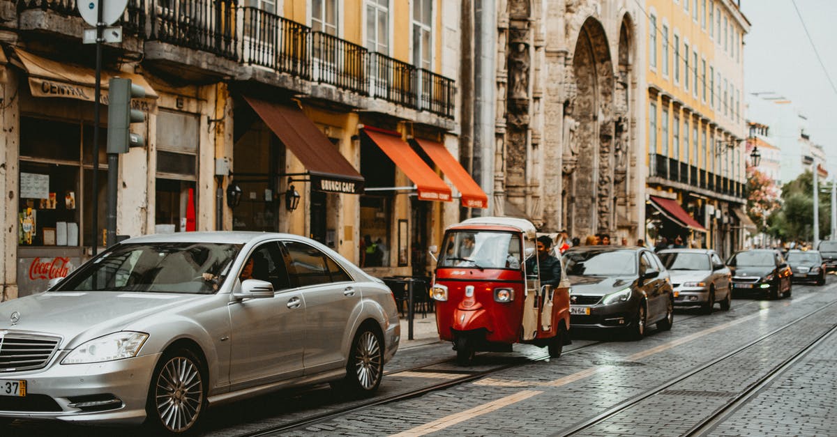 Portugal Schengen visa, tourist or short-stay? - Silver Sedan Beside Yellow Building Portugal Schengen visa, tourist or short-stay? - Silver Sedan Beside Yellow Building