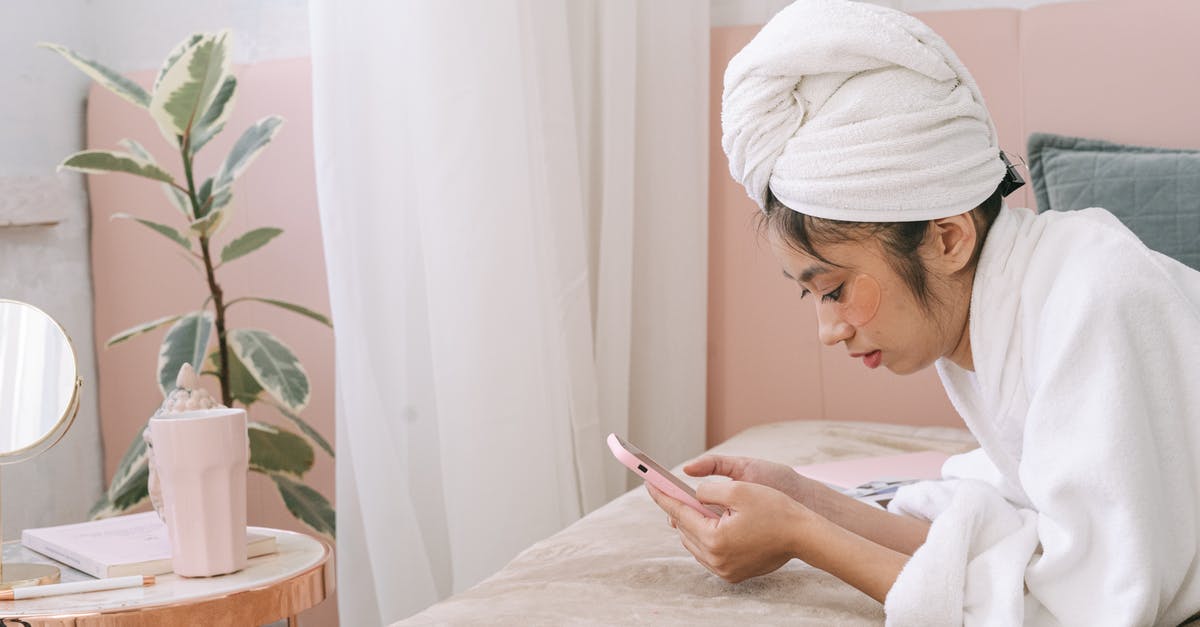 Portuguese phrasebook using IPA - Woman in White Hijab Holding Smartphone Portuguese phrasebook using IPA - Woman in White Hijab Holding Smartphone