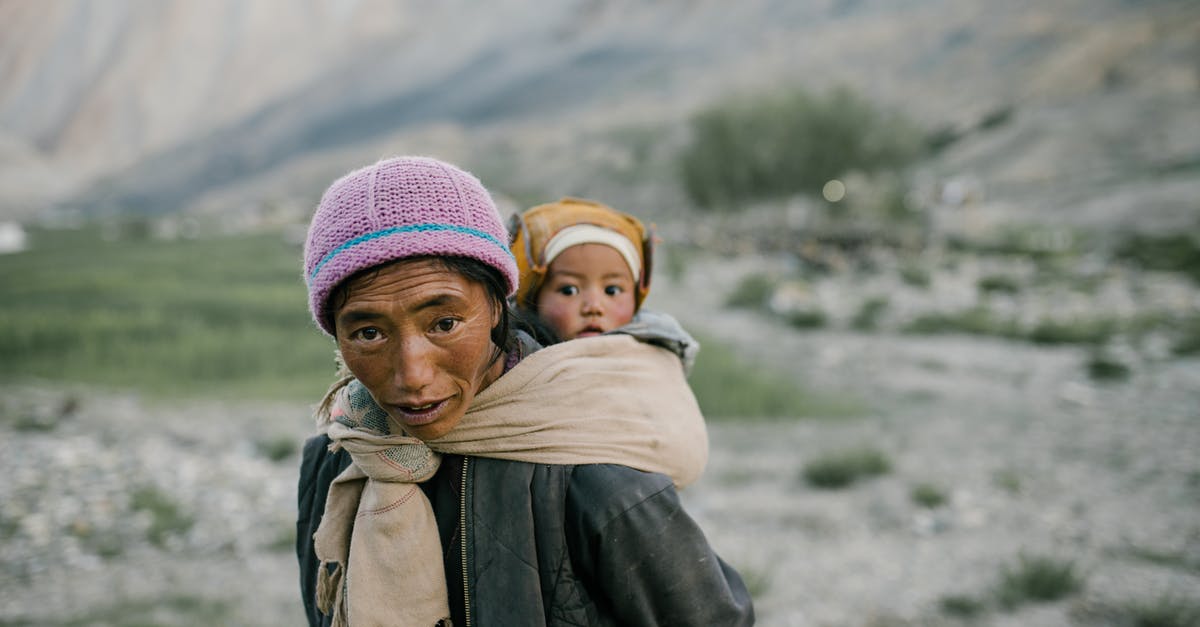 Possible issues when carrying multiple laptops/phones from India to Canada? - Woman Carrying a Child on Her Back Possible issues when carrying multiple laptops/phones from India to Canada? - Woman Carrying a Child on Her Back