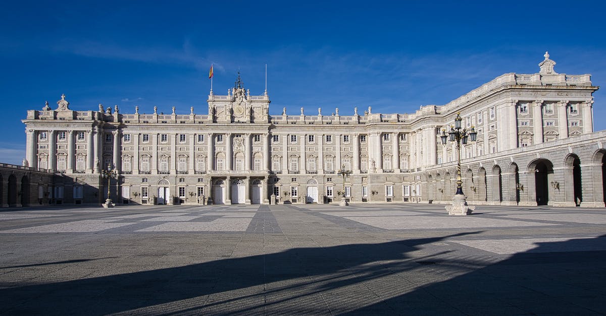 Possible problems for British resident of Spain travelling in Schengen area? - White Concrete Building Under Blue Sky Possible problems for British resident of Spain travelling in Schengen area? - White Concrete Building Under Blue Sky