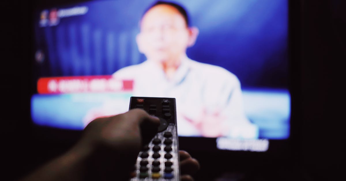 Possible reimbursement for missed connection due to gate change - Crop anonymous person with remote controller switching channels while watching TV on blurred background in living room with dim light Possible reimbursement for missed connection due to gate change - Crop anonymous person with remote controller switching channels while watching TV on blurred background in living room with dim light