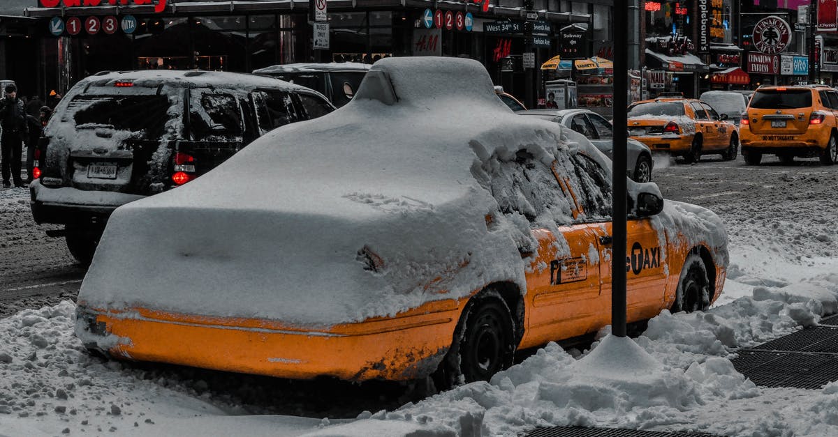 Possible taxi scams if fare is agreed in advance? - Yellow Car Covered with Snow Possible taxi scams if fare is agreed in advance? - Yellow Car Covered with Snow