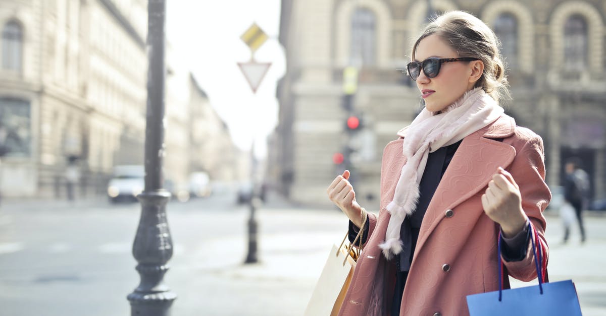 Post Brexit EU travel over 90 days - Woman in Pink Coat Holding Shopping Bags Post Brexit EU travel over 90 days - Woman in Pink Coat Holding Shopping Bags