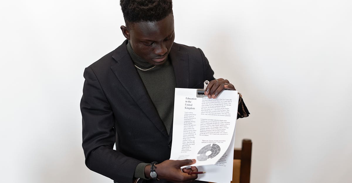 Presenting documents at the US Embassy -
A Man Presenting Documents Presenting documents at the US Embassy -
A Man Presenting Documents