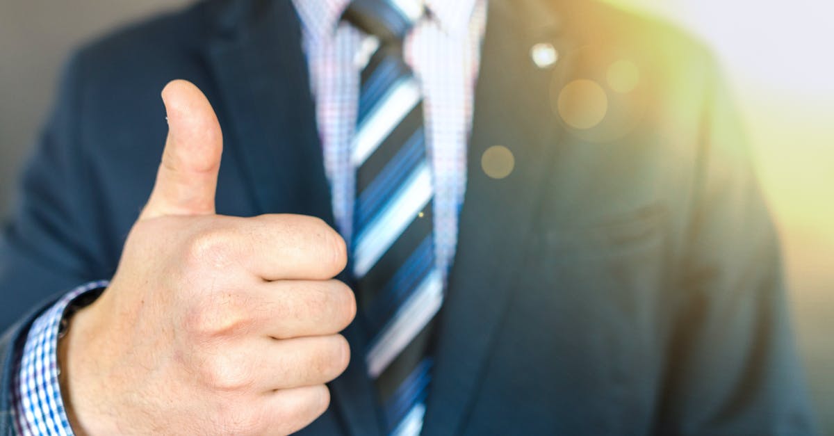 Previously overstayed US, ESTA denied, is visa likely to be approved? [closed] - Close-up Photo of Man Wearing Black Suit Jacket Doing Thumbs Up Gesture