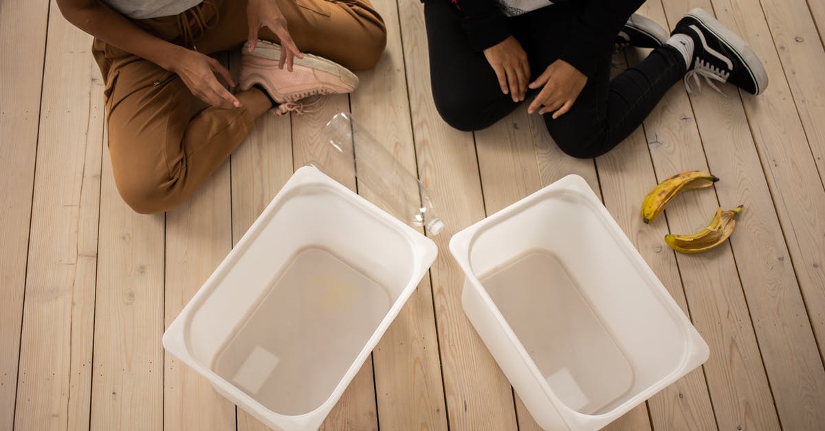 Processing of visa from Govt website vs VFS Global - Unrecognizable people sorting garbage on floor Processing of visa from Govt website vs VFS Global - Unrecognizable people sorting garbage on floor