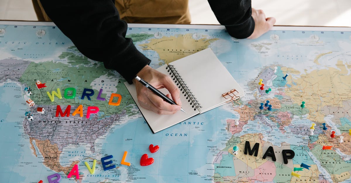 Proof for onward travel in Non-schengen countries of EU - Person Writing on a Notebook Place on a World Map Proof for onward travel in Non-schengen countries of EU - Person Writing on a Notebook Place on a World Map