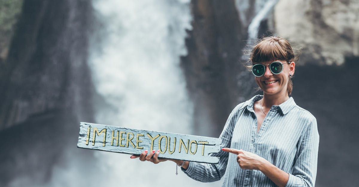 Proof of Accommodation: One day trip in France - Woman Carrying Im Here You Not Plank on Front of Waterfalls Proof of Accommodation: One day trip in France - Woman Carrying Im Here You Not Plank on Front of Waterfalls