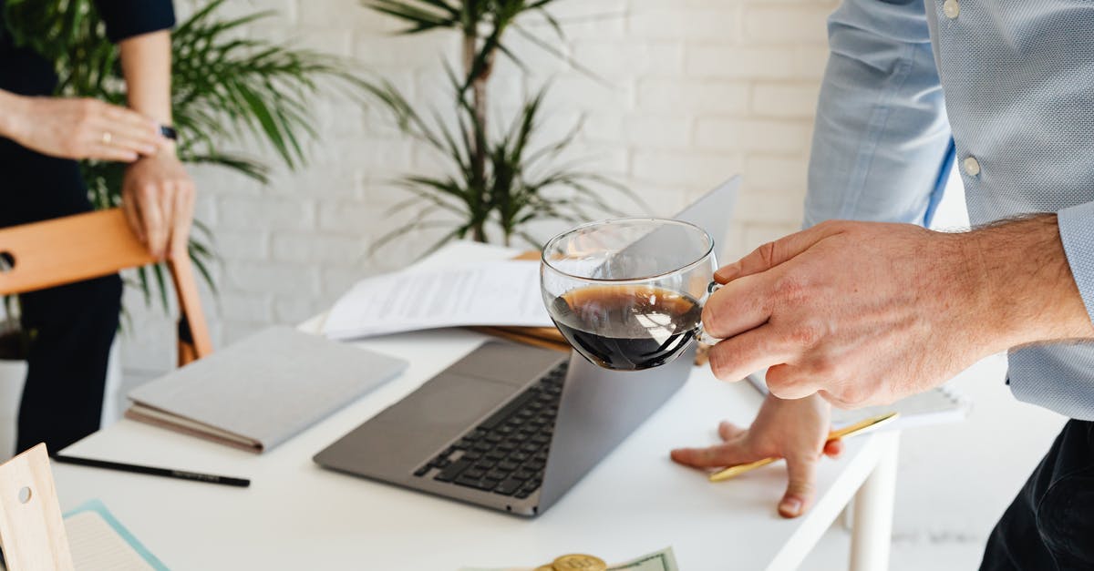 Proof of financial stability for Portugal - Person Holding Clear Wine Glass Proof of financial stability for Portugal - Person Holding Clear Wine Glass
