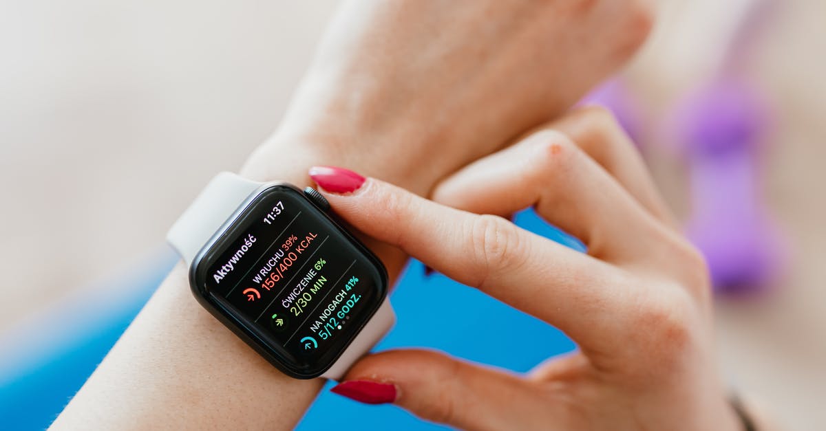 Proof of Home Address UK Visa Application - Unrecognizable female with manicure checking smartwatch on hand while sitting on yoga mat Proof of Home Address UK Visa Application - Unrecognizable female with manicure checking smartwatch on hand while sitting on yoga mat
