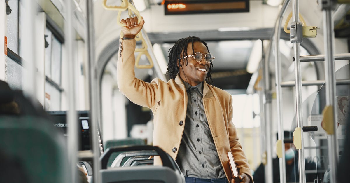 Public Transport planner for Hanover (Hannover)? - Smiling Man in Public Transport Public Transport planner for Hanover (Hannover)? - Smiling Man in Public Transport