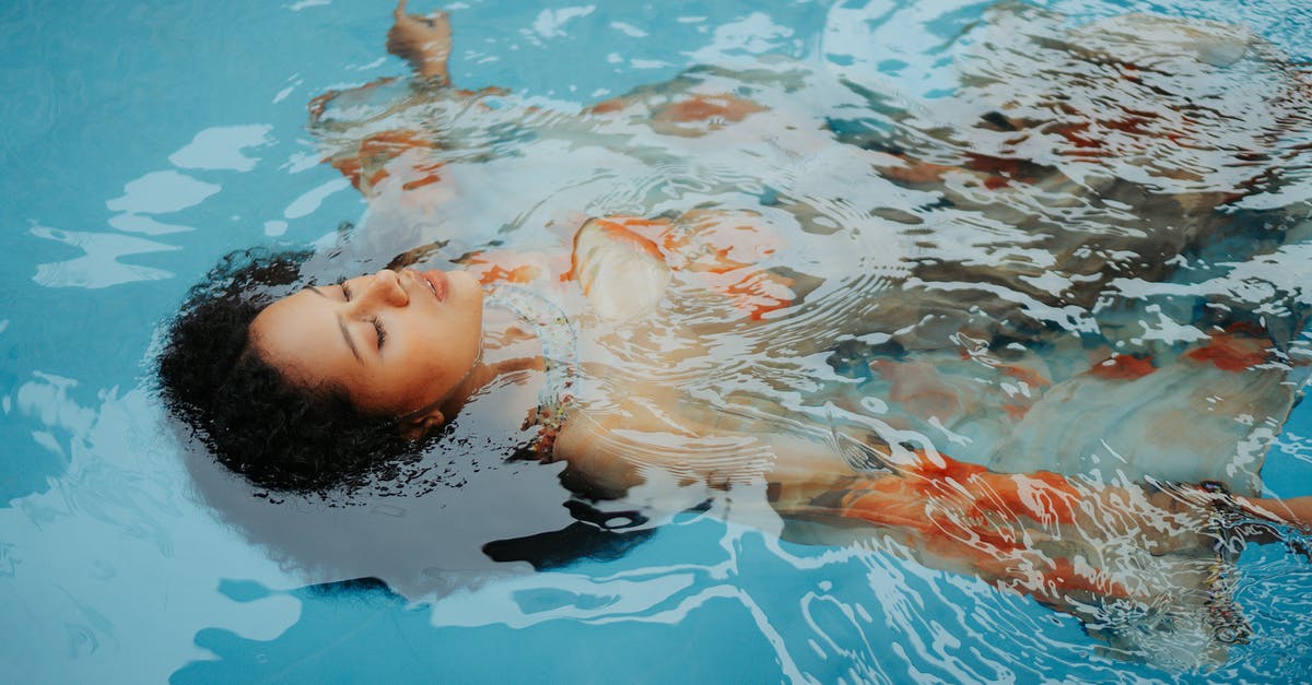 Publicly available pools for lap/lane swimming near Itaewon in Seoul, SK? [closed] - Photo of a Woman Floating on a Pool