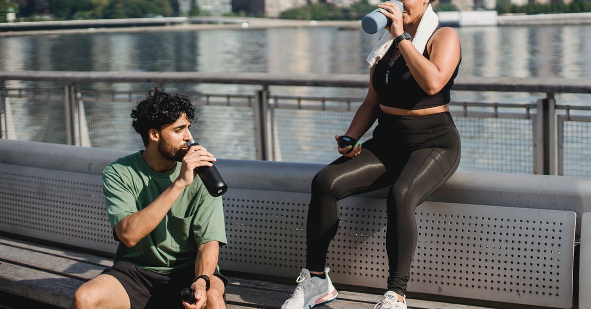 Question about water bottles - 2 Women in Black Tank Top and Black Shorts Sitting on Bench Question about water bottles - 2 Women in Black Tank Top and Black Shorts Sitting on Bench