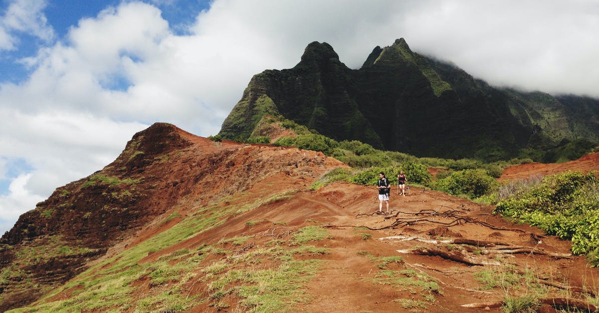 "Circular" hiking trails in Iceland? - Two People Standing on Mountain Under White Sky "Circular" hiking trails in Iceland? - Two People Standing on Mountain Under White Sky