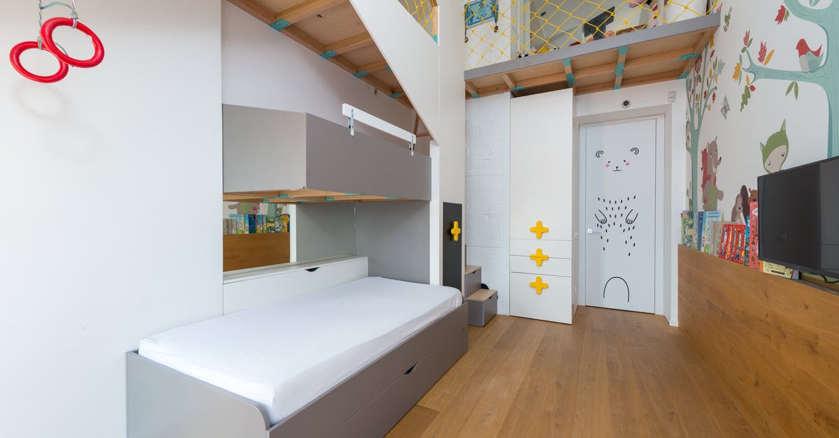 "Lord of the Rings" Tours in New Zealand - Interior of kid bedroom with bunk bed "Lord of the Rings" Tours in New Zealand - Interior of kid bedroom with bunk bed