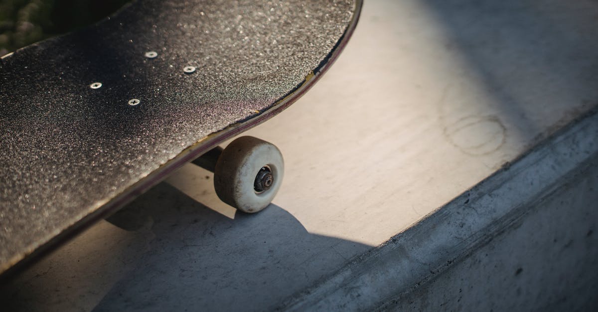 Rail cost from Weeze to Düsseldorf - Shabby black skateboard nose on concrete surface in sunlight Rail cost from Weeze to Düsseldorf - Shabby black skateboard nose on concrete surface in sunlight