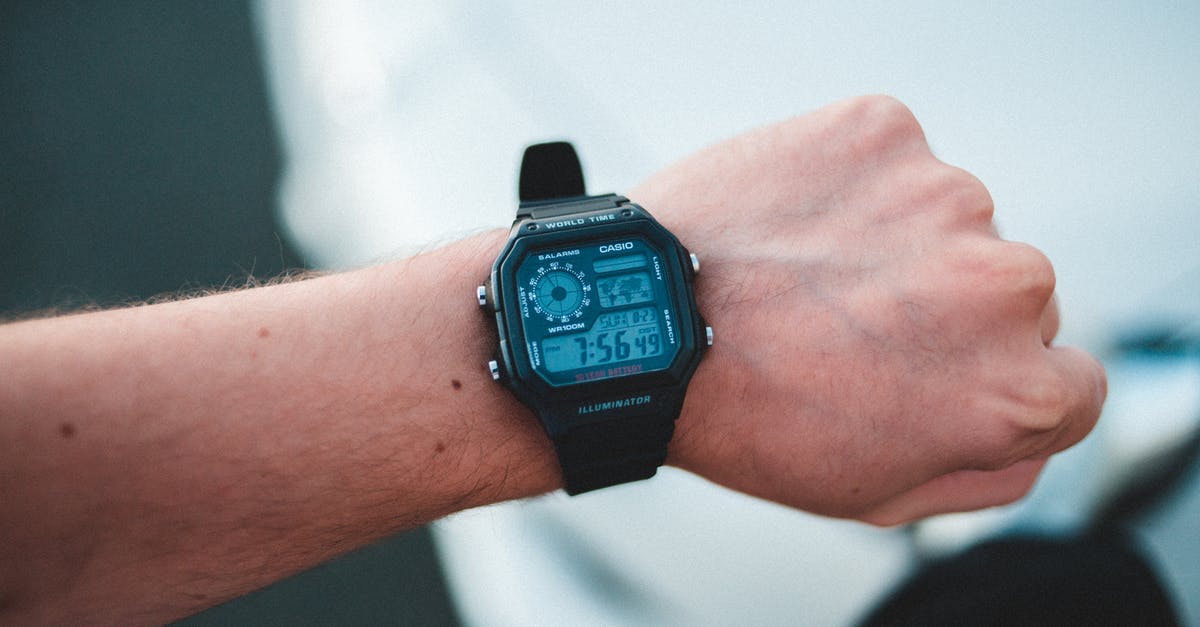 Realistic time to get to and from LAX? - Man demonstrating modern electronic wristwatch Realistic time to get to and from LAX? - Man demonstrating modern electronic wristwatch