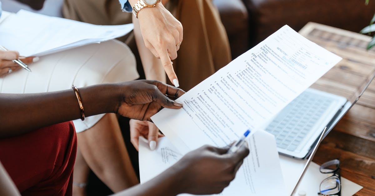 Reality Check on Data Roaming and Tethering in Ireland/Poland - Multiethnic businesswomen checking information in documents Reality Check on Data Roaming and Tethering in Ireland/Poland - Multiethnic businesswomen checking information in documents