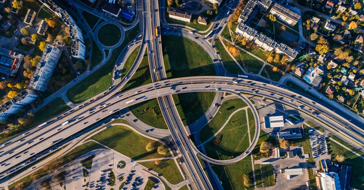 Real-time Traffic on Google Maps on Android - Aerial Photo of Buildings and Roads Real-time Traffic on Google Maps on Android - Aerial Photo of Buildings and Roads