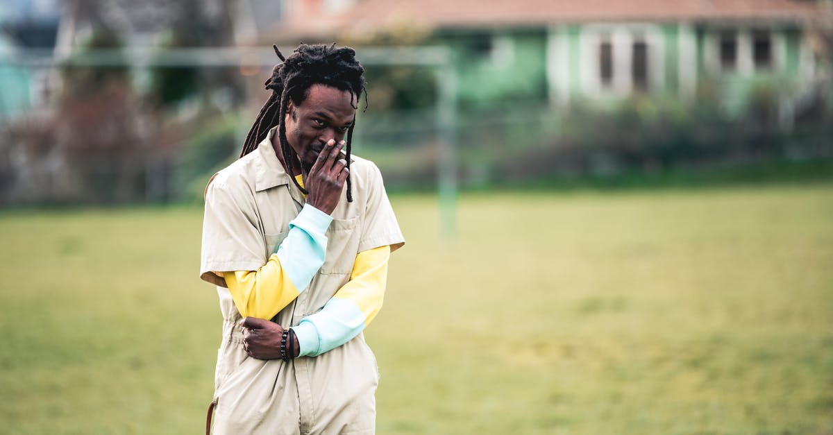 Received fine for parking - court appearance not required - now not payable - Black man in green court in suburb Received fine for parking - court appearance not required - now not payable - Black man in green court in suburb