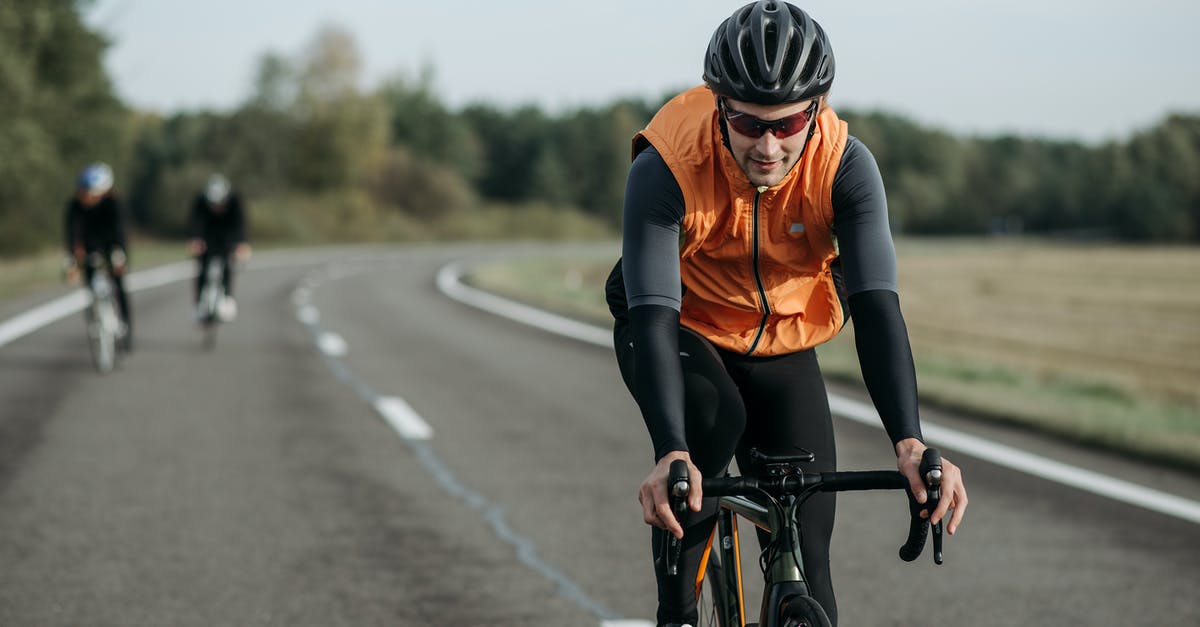 Received letter from police for being drunk and riding bicycle in Germany [closed] - Close-Up Shot of a Cyclist Riding a Bike on the Road
