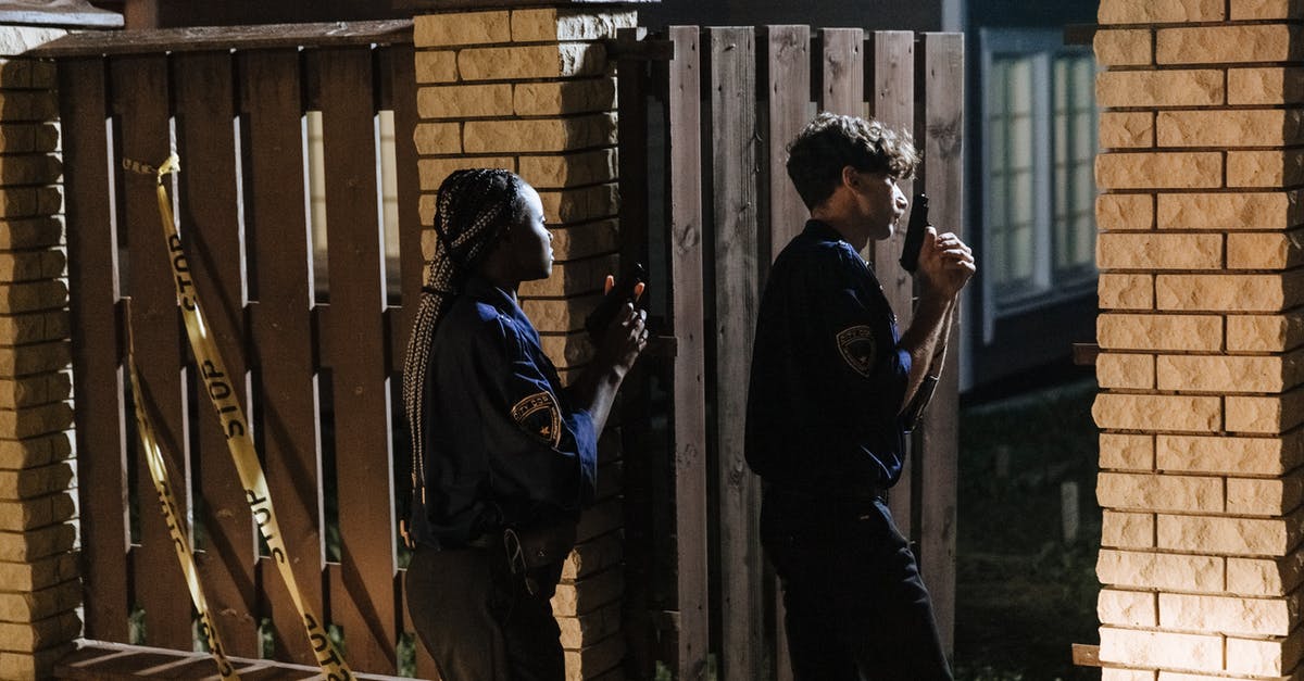 Re-entering Canada after minor contact with the police there - Police Officer Entering a House While Holding Guns Re-entering Canada after minor contact with the police there - Police Officer Entering a House While Holding Guns