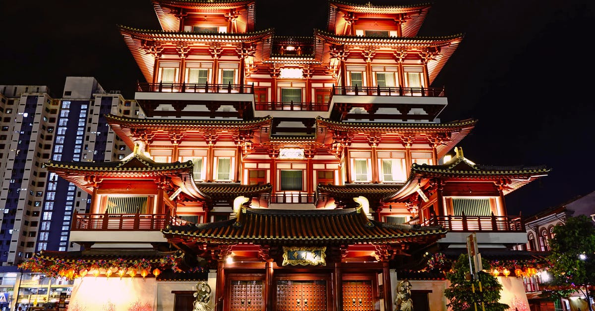 Re-Entering Singapore on a tourist visa - View of Building Lit Up at Night Re-Entering Singapore on a tourist visa - View of Building Lit Up at Night